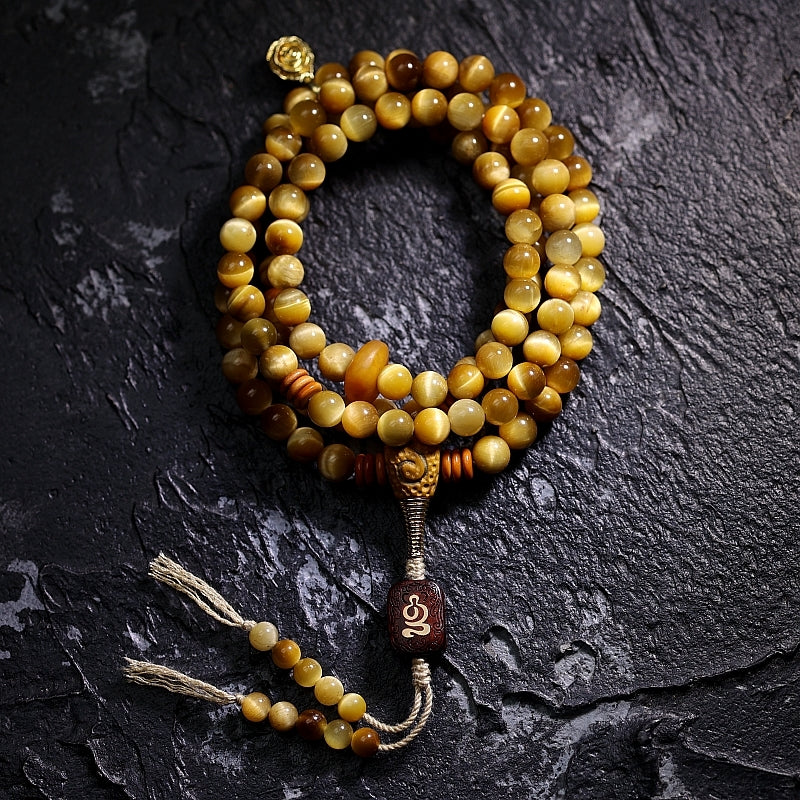Kailashforce Artisanal Tibetan Gold Tiger’s Eye 108 Bead Mala Bracelet Sandalwood Backcloud, Brass Nine Palaces Amber Tassel Sacred Jewelry for Men Women
