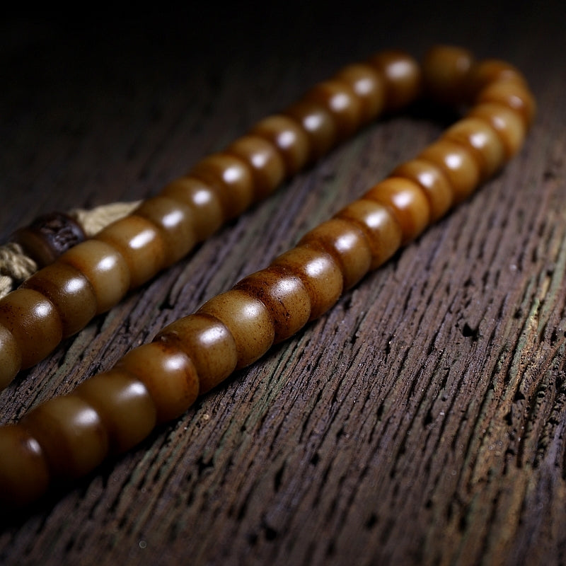 Kailashforce Artisanal Tibetan Yak Bone 108 Bead Mala Bracelet Vintage Handcarved with Sandalwood Inlays, Leather Tassel Ancient Scripture Accents Spiritual Jewelry for Men Women