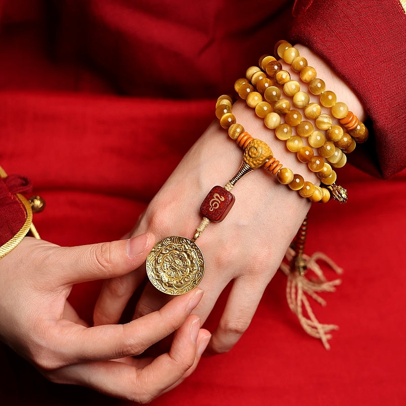 Kailashforce Artisanal Tibetan Gold Tiger’s Eye 108 Bead Mala Bracelet Sandalwood Backcloud, Brass Nine Palaces Amber Tassel Sacred Jewelry for Men Women