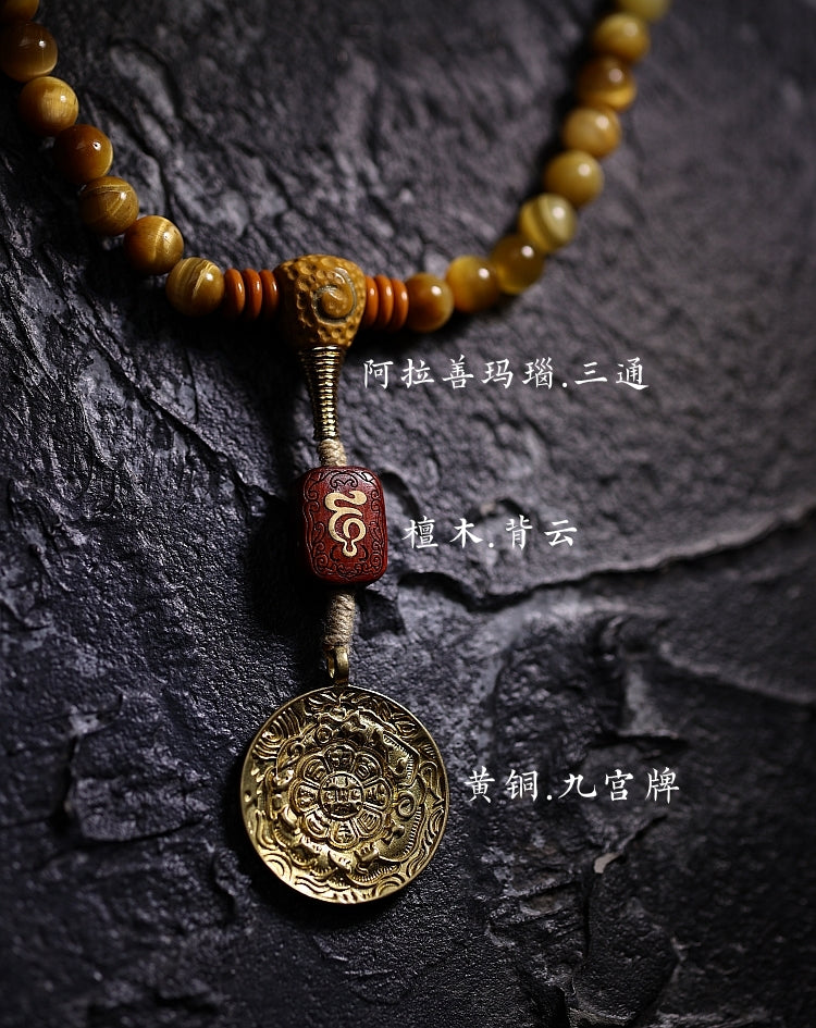 Kailashforce Artisanal Tibetan Gold Tiger’s Eye 108 Bead Mala Bracelet Sandalwood Backcloud, Brass Nine Palaces Amber Tassel Sacred Jewelry for Men Women