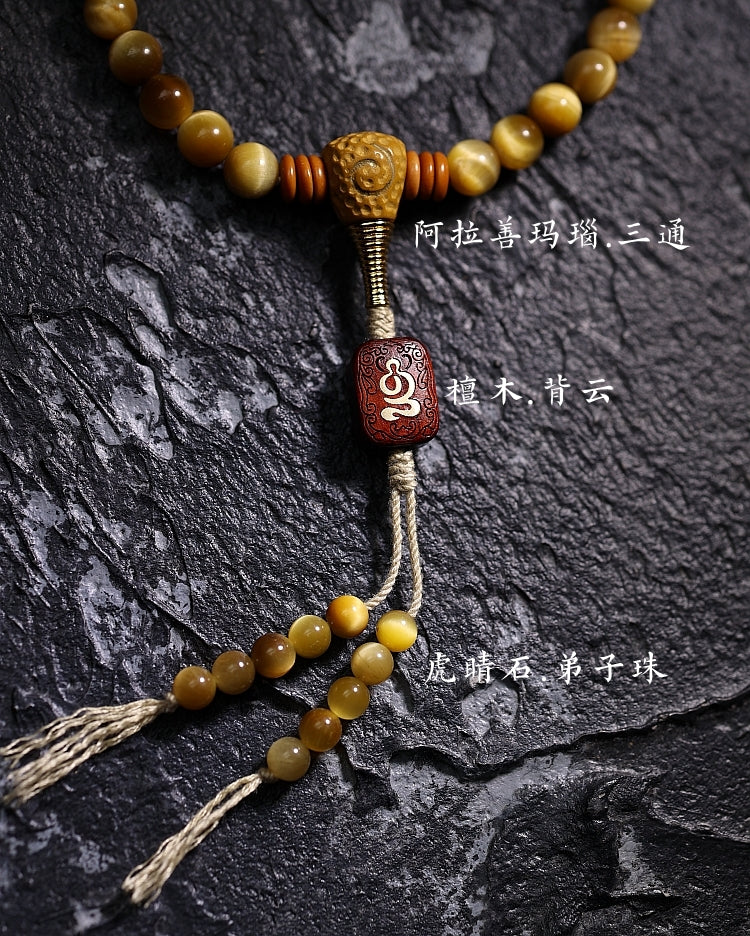 Kailashforce Artisanal Tibetan Gold Tiger’s Eye 108 Bead Mala Bracelet Sandalwood Backcloud, Brass Nine Palaces Amber Tassel Sacred Jewelry for Men Women