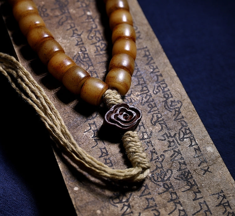 Kailashforce Artisanal Tibetan Yak Bone 108 Bead Mala Bracelet Vintage Handcarved with Sandalwood Inlays, Leather Tassel Ancient Scripture Accents Spiritual Jewelry for Men Women